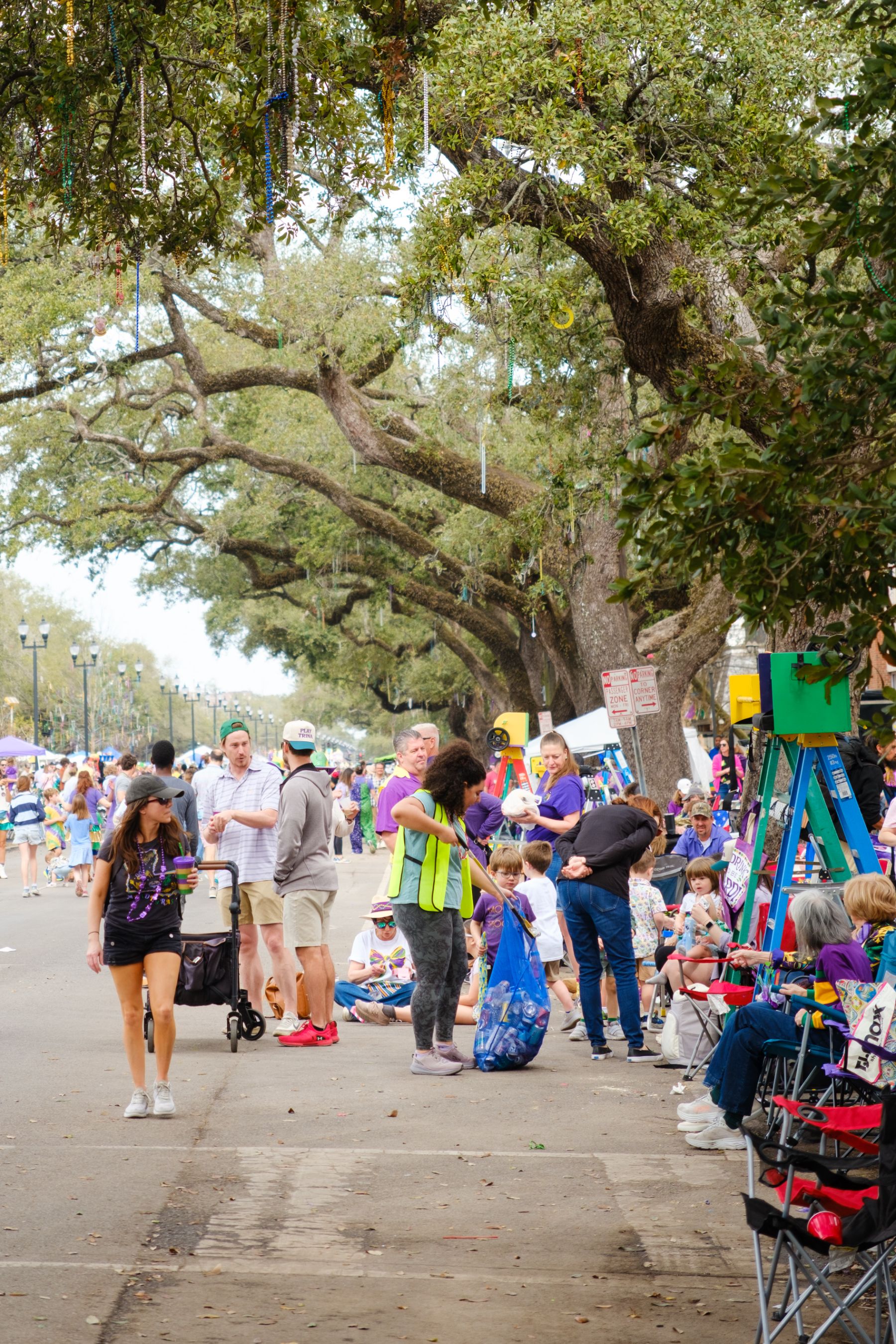 Every Can Counts volunteers at a Mardi Gras recycling station